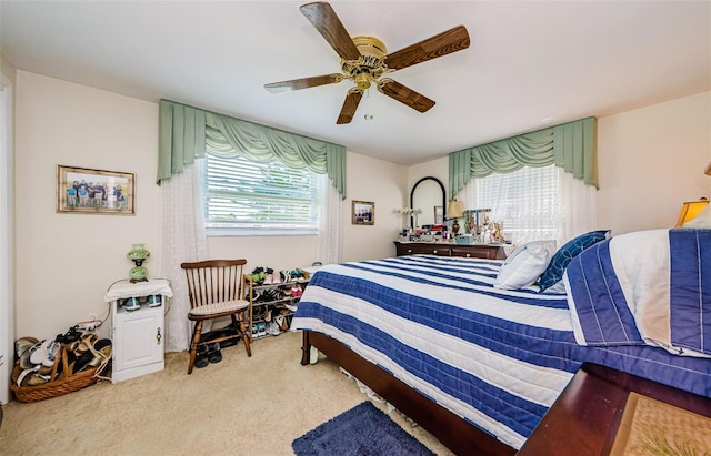 4107 Glissade Dr, New Port Richey, FL 34652 - bedroom featuring carpet and a ceiling fan