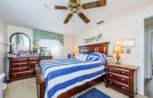 4107 Glissade Dr, New Port Richey, FL 34652 - bedroom with a ceiling fan, light colored carpet, and visible vents