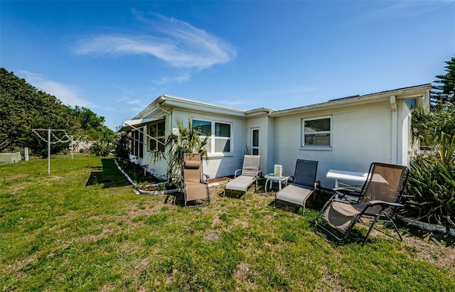 4107 Glissade Dr, New Port Richey, FL 34652 - back of property with a lawn