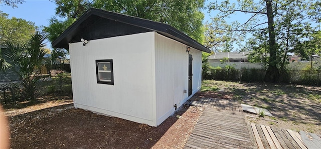 807 S Castle Ct, Tampa, FL 33612 - view of outdoor structure with an outbuilding and fence