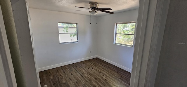 807 S Castle Ct, Tampa, FL 33612 - empty room featuring baseboards, a textured ceiling, ceiling fan, and dark wood-type flooring