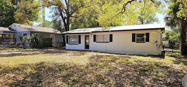 807 S Castle Ct, Tampa, FL 33612 - ranch-style house with metal roof and fence