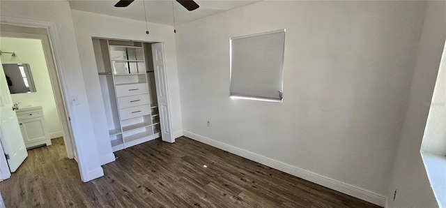 807 S Castle Ct, Tampa, FL 33612 - unfurnished bedroom featuring baseboards, a closet, ceiling fan, and dark wood-style flooring