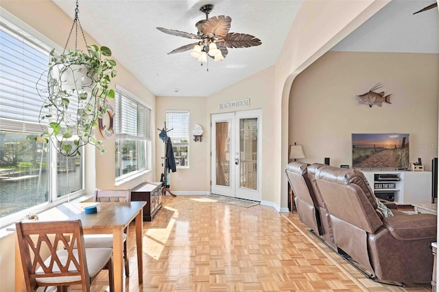 4058 Centavo Ct, Hernando Beach, FL 34607 - foyer with baseboards, ceiling fan, french doors, lofted ceiling, and arched walkways