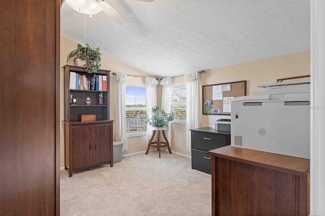 4058 Centavo Ct, Hernando Beach, FL 34607 - office area with a textured ceiling, light colored carpet, vaulted ceiling, ceiling fan, and baseboards