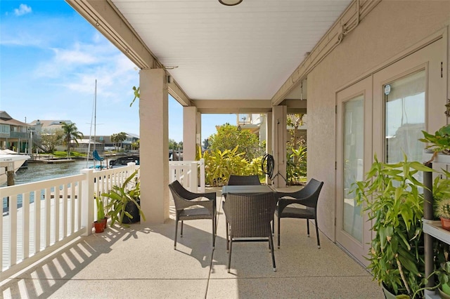 4058 Centavo Ct, Hernando Beach, FL 34607 - view of patio with a water view