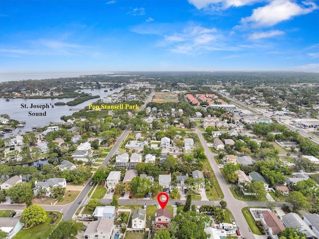 bird's eye view featuring a residential view and a water view
