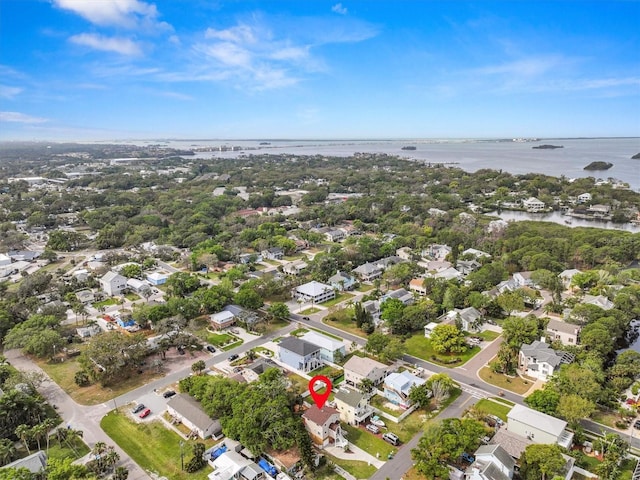 drone / aerial view with a residential view and a water view