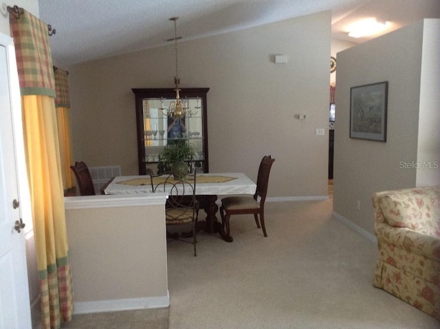 3850 Plantation Blvd, Leesburg, FL 34748 - carpeted dining area with baseboards and lofted ceiling