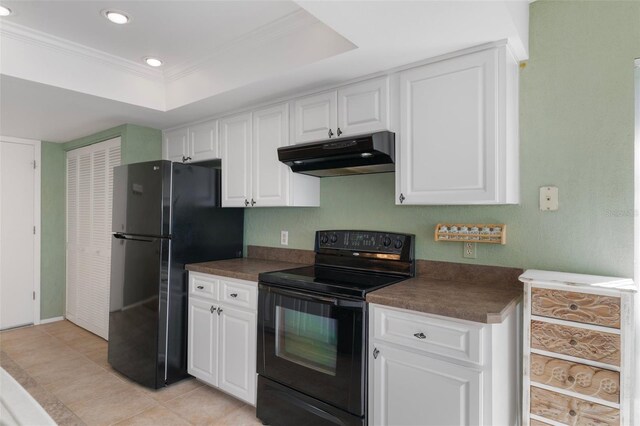 6530 Pine Meadows Dr, Spring Hill, FL 34606 - kitchen featuring dark countertops, black appliances, under cabinet range hood, and a raised ceiling