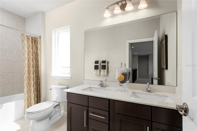 full bath featuring double vanity, toilet, a sink, and shower / bath combo with shower curtain