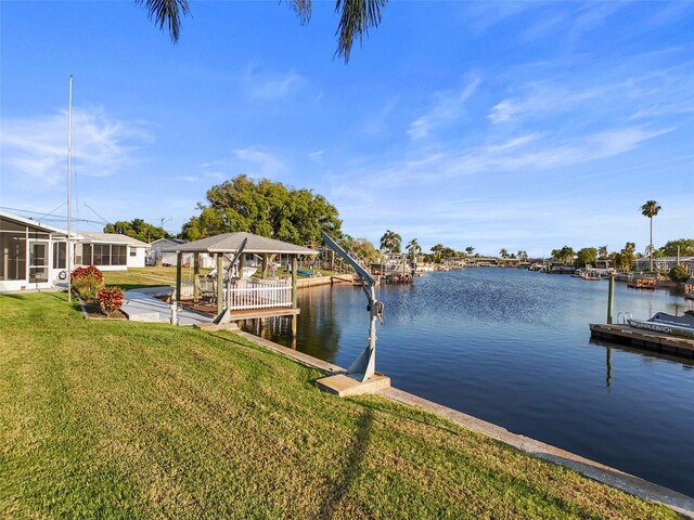 6536 Beach Blvd, Hudson, FL 34667 - dock featuring a water view, a lawn, and a gazebo