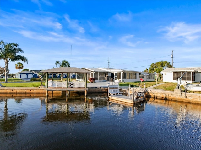 6536 Beach Blvd, Hudson, FL 34667 - dock with a residential view, a water view, and boat lift