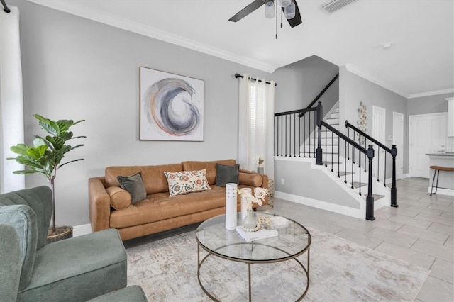 3465 Bumelia Ln, New Port Richey, FL 34655 - tiled living area with crown molding, stairs, baseboards, visible vents, and a ceiling fan