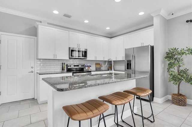 3465 Bumelia Ln, New Port Richey, FL 34655 - kitchen featuring a sink, visible vents, crown molding, and appliances with stainless steel finishes