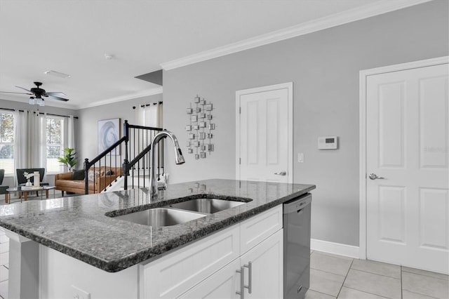 3465 Bumelia Ln, New Port Richey, FL 34655 - kitchen featuring crown molding, stainless steel dishwasher, a center island with sink, a sink, and a ceiling fan