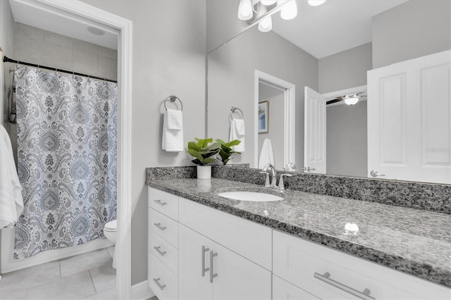 3465 Bumelia Ln, New Port Richey, FL 34655 - bathroom featuring toilet, vanity, and tile patterned floors