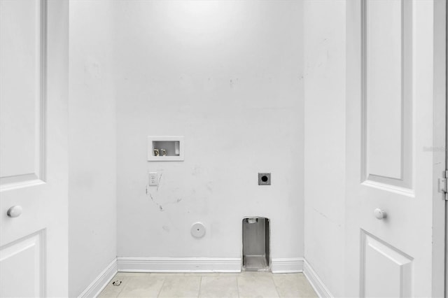 3465 Bumelia Ln, New Port Richey, FL 34655 - laundry area featuring electric dryer hookup, laundry area, light tile patterned floors, gas dryer hookup, and hookup for a washing machine