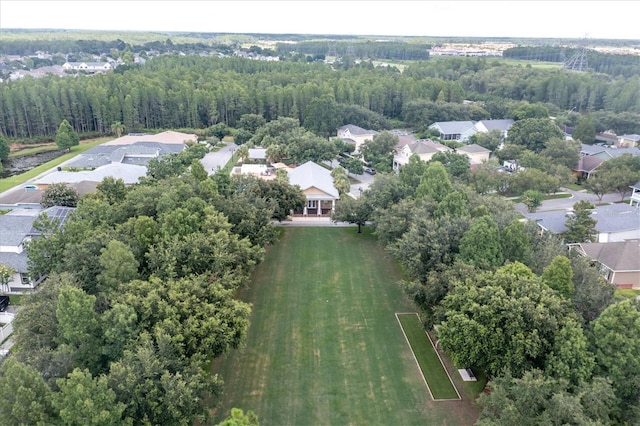 3465 Bumelia Ln, New Port Richey, FL 34655 - birds eye view of property featuring a wooded view and a residential view