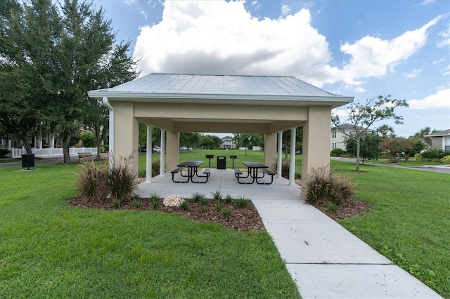3465 Bumelia Ln, New Port Richey, FL 34655 - surrounding community with a patio, a gazebo, and a lawn