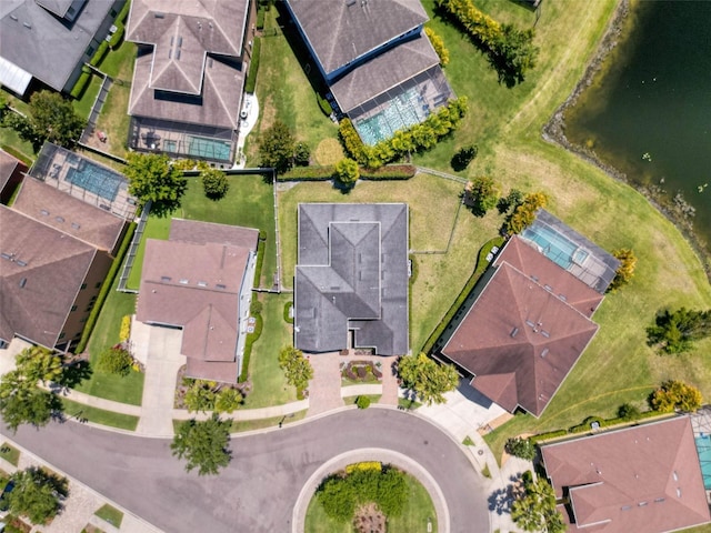 aerial view featuring a water view and a residential view