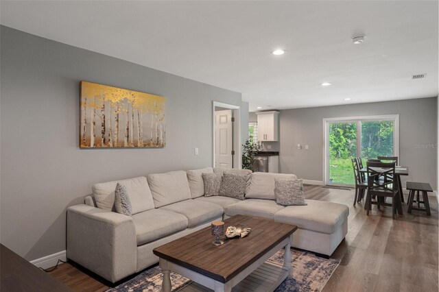 604 Kinnear Dr, Brooksville, FL 34601 - living room featuring wood finished floors, recessed lighting, and baseboards