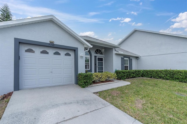 9348 Villa Entrada, New Port Richey, FL 34655 - single story home featuring an attached garage, stucco siding, a front lawn, and concrete driveway