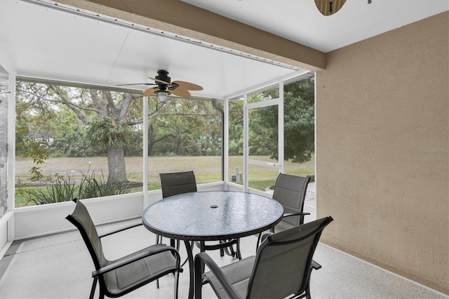 9348 Villa Entrada, New Port Richey, FL 34655 - sunroom with outdoor dining space and a ceiling fan