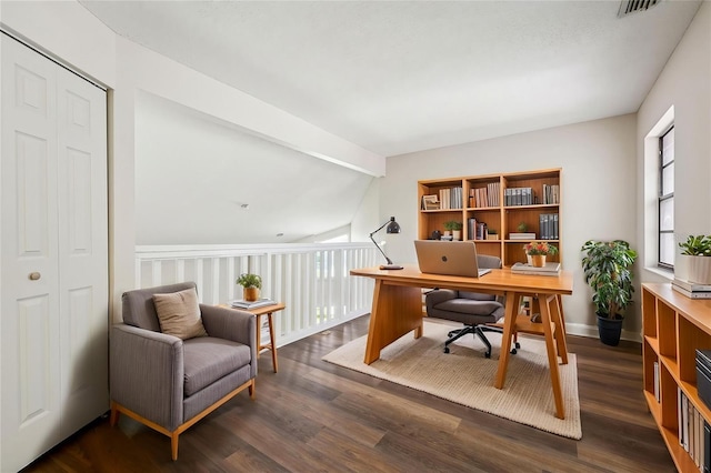 office area featuring visible vents, dark wood-style floors, and lofted ceiling with beams