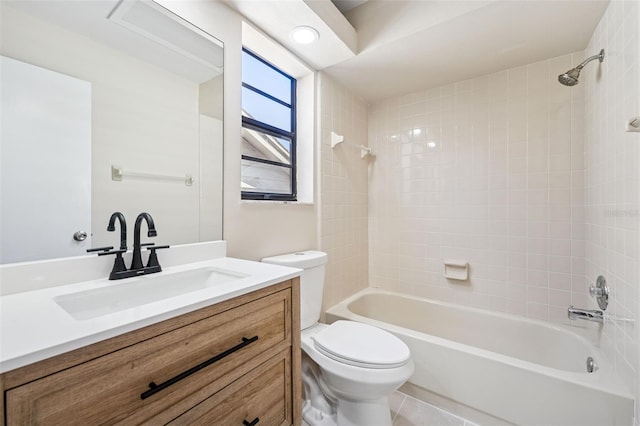full bath featuring toilet, vanity, and shower / bathing tub combination
