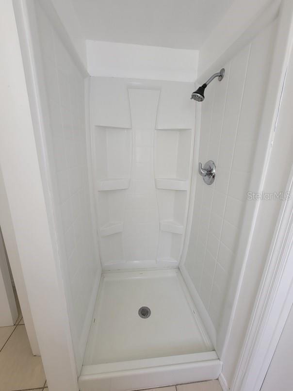 bathroom with a stall shower