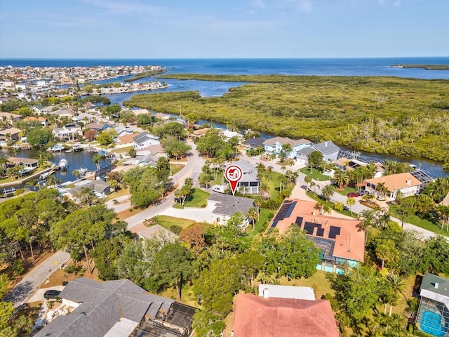 aerial view with a residential view and a water view
