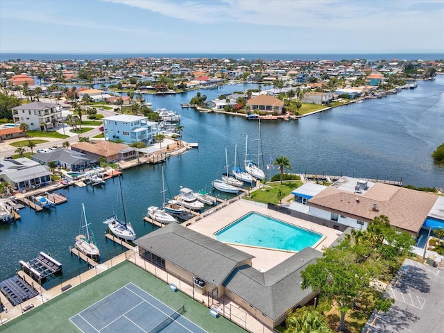 birds eye view of property featuring a water view