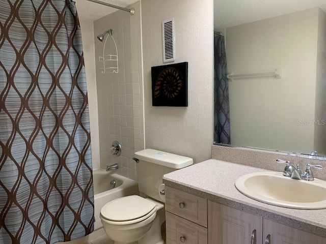 2600 Ocean Shore Blvd Unit 111, Ormond Beach, FL 32176 - full bathroom featuring vanity, shower / tub combo, toilet, and a textured wall