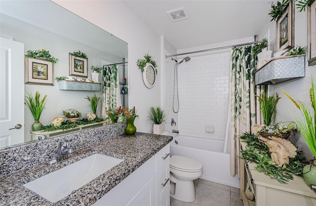 36419 Flats St, Zephyrhills, FL 33541 - bathroom featuring vanity, shower / bathtub combination with curtain, toilet, and tile patterned floors