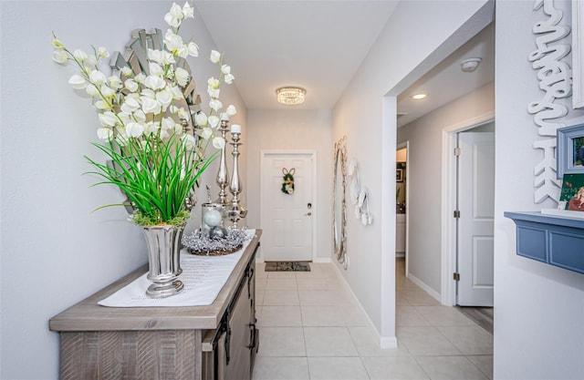 36419 Flats St, Zephyrhills, FL 33541 - doorway featuring light tile patterned floors and baseboards