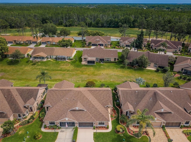 9636 Brookdale Dr, New Port Richey, FL 34655 - birds eye view of property with a residential view and a forest view