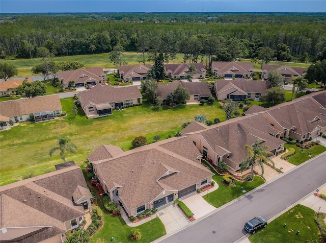 9636 Brookdale Dr, New Port Richey, FL 34655 - bird's eye view with a residential view and a forest view