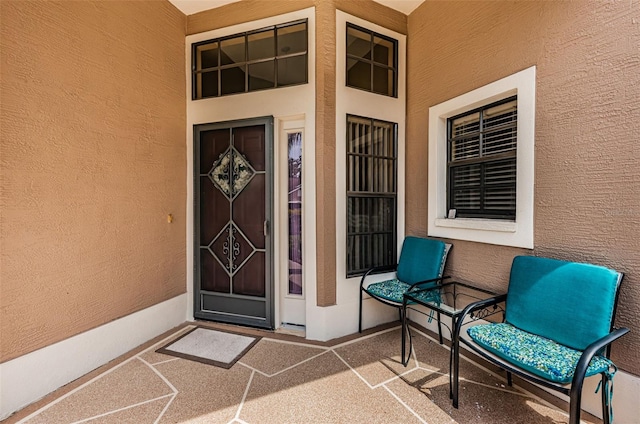 9636 Brookdale Dr, New Port Richey, FL 34655 - view of exterior entry with stucco siding