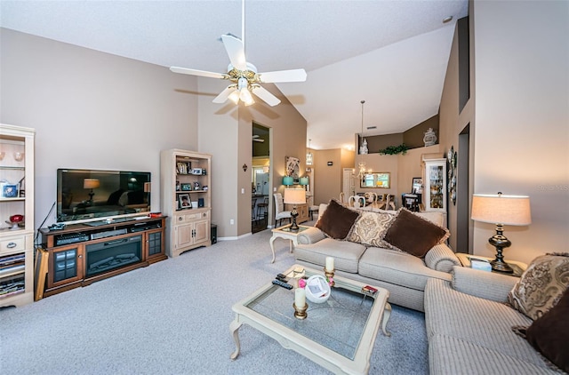 9636 Brookdale Dr, New Port Richey, FL 34655 - carpeted living area featuring baseboards, vaulted ceiling, and a ceiling fan