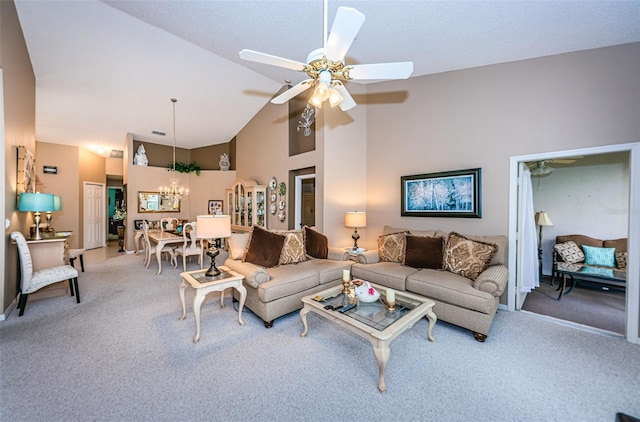 9636 Brookdale Dr, New Port Richey, FL 34655 - living area featuring ceiling fan with notable chandelier, high vaulted ceiling, and carpet floors