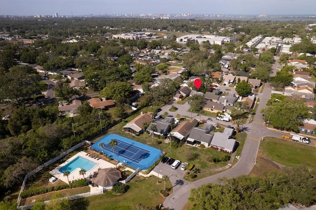 birds eye view of property with a residential view