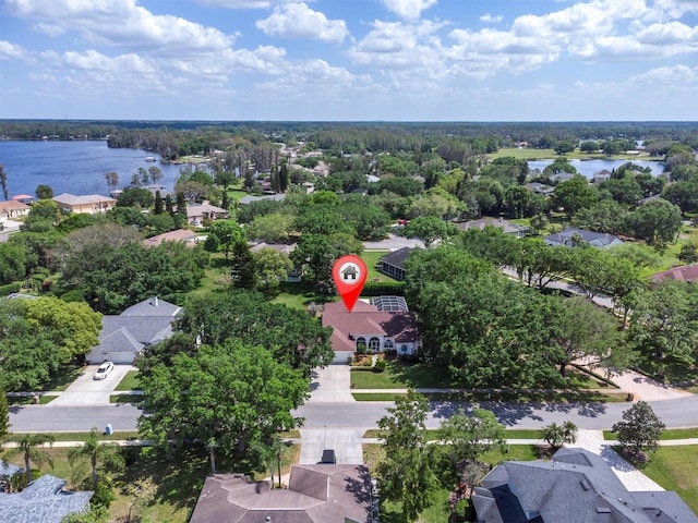 bird's eye view with a water view