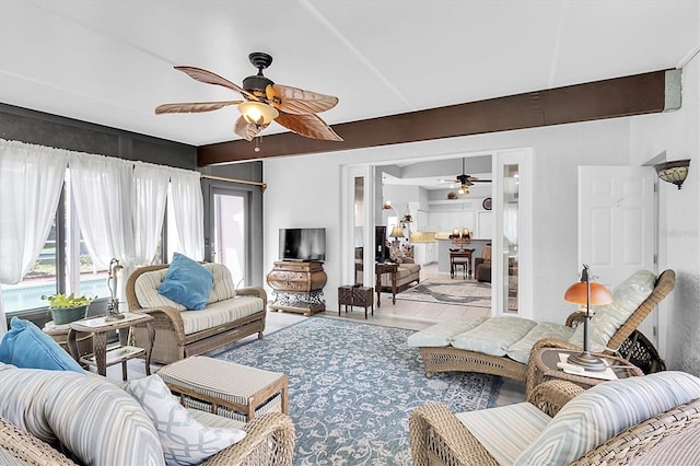 living area with ceiling fan