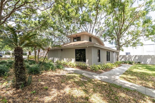 view of side of property with fence