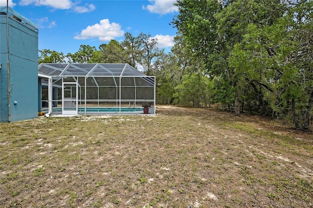 view of yard featuring an outdoor pool