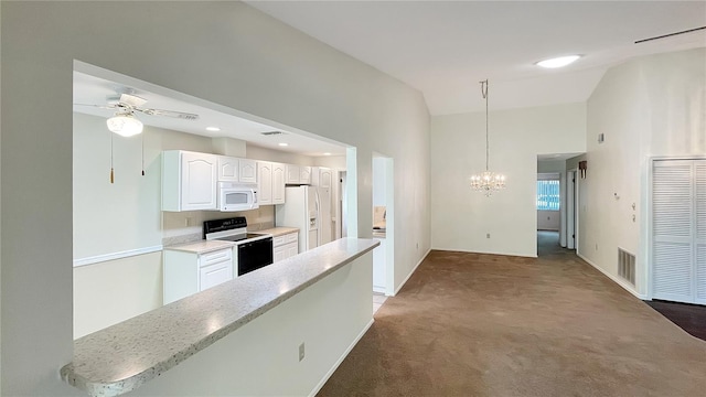 kitchen with visible vents, white appliances, white cabinetry, ceiling fan with notable chandelier, and carpet floors