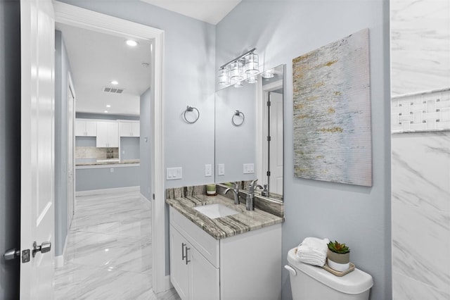 bathroom featuring visible vents, marble finish floor, toilet, recessed lighting, and vanity
