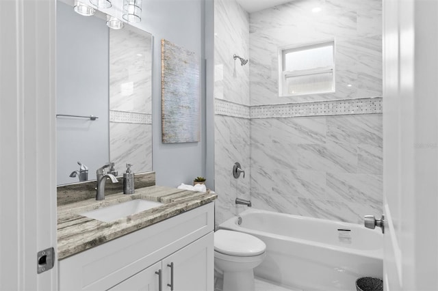 full bath featuring  shower combination, toilet, and vanity