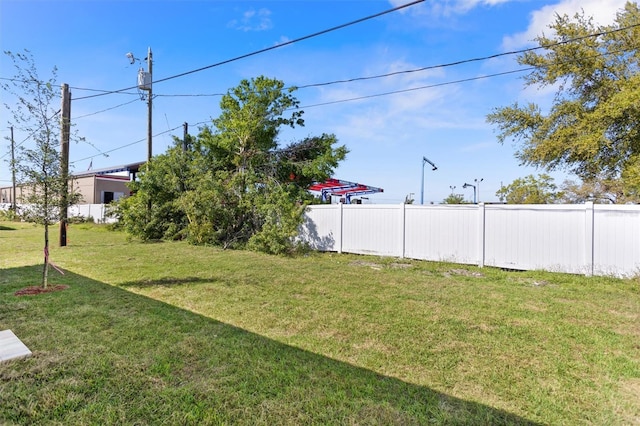 view of yard featuring fence